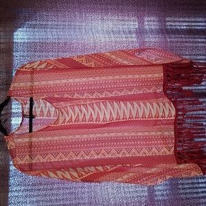 Pullover with Fringes @ the bottom very comfortable in excellent condition